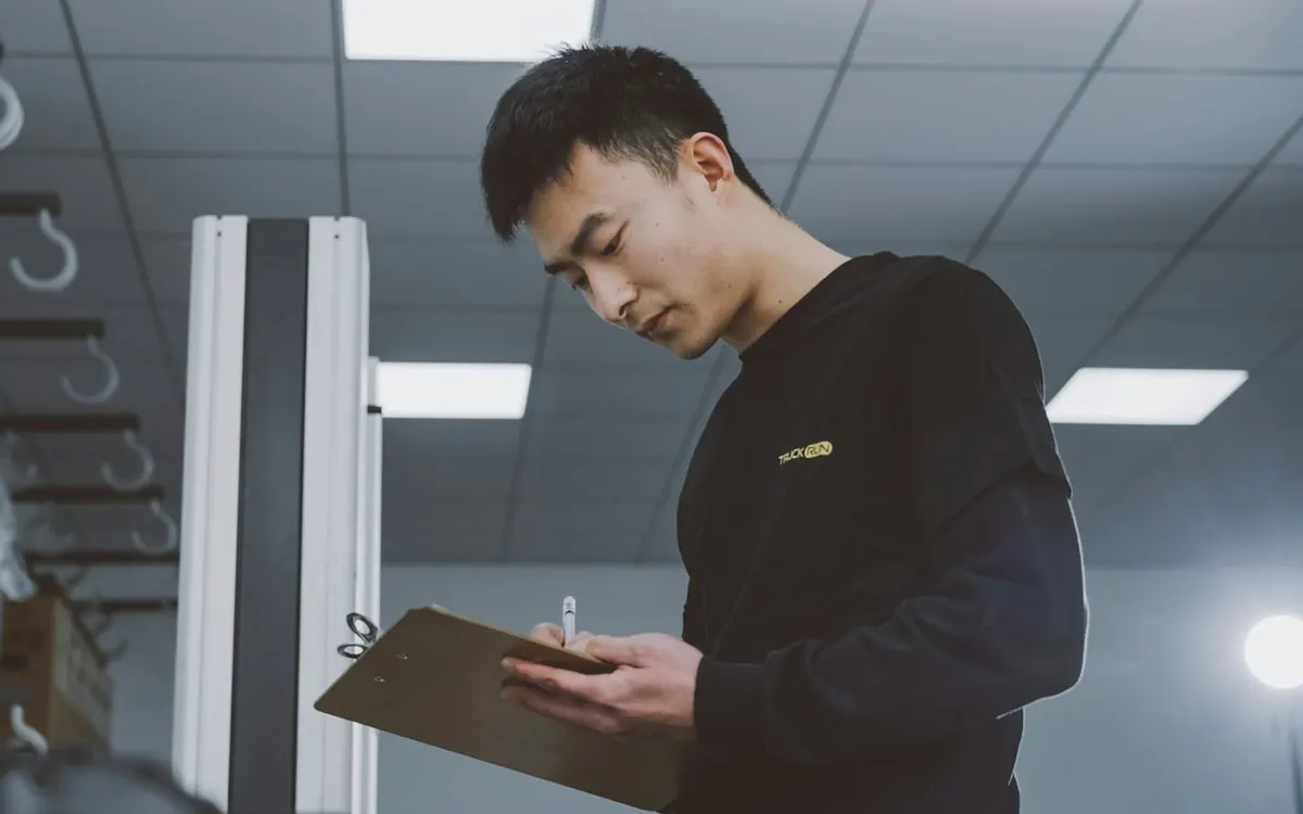 Auditor with a folder during an inspection